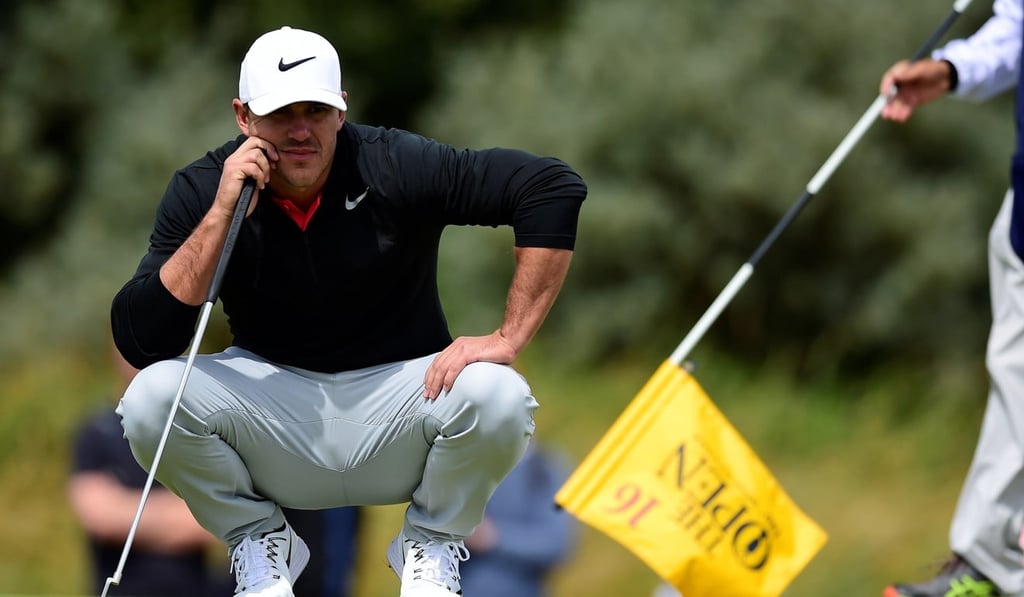 Brooks Koepka lines up a putt during The Open. Photo: Reuters