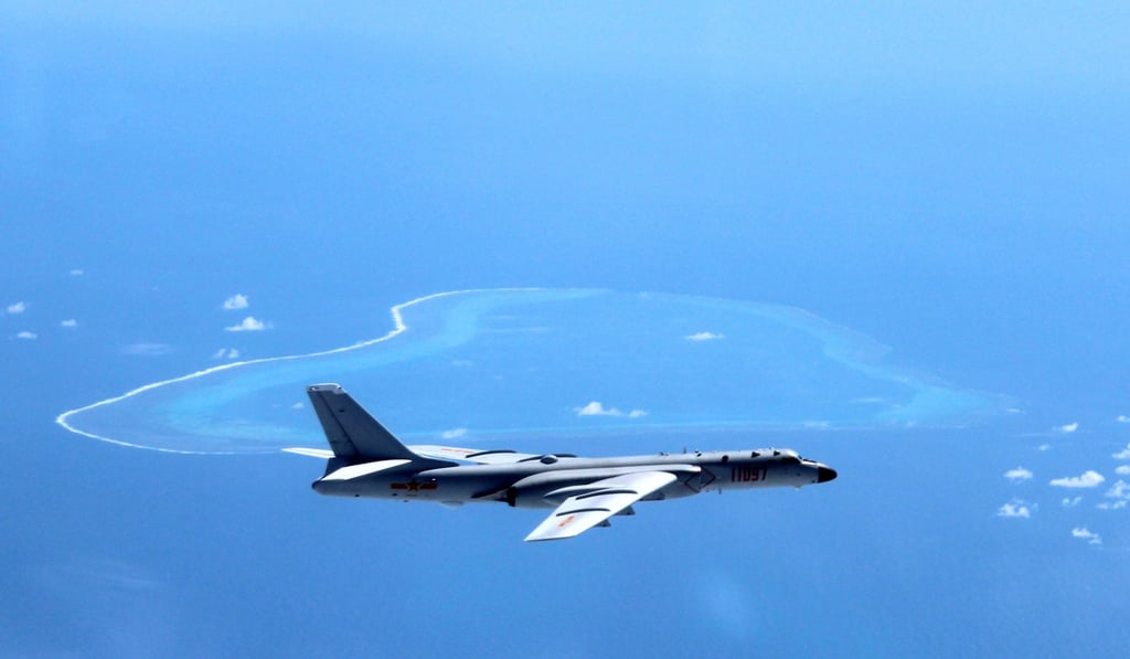 A Chinese H-6K bomber patrols islands and reefs in the South China Sea in May. China's state broadcaster on May 7 showed navy bombers taking part in exercises over the South China Sea, including one involving the detection and expulsion of foreign military surveillance aircraft such as those deployed regularly in the area by the US and others. Photo: AP