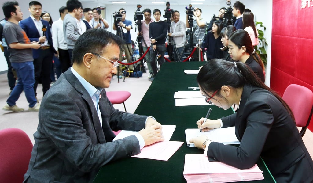 NPC deputy Michael Tien visiting the election office in Sheung Wan on Friday. Photo: David Wong