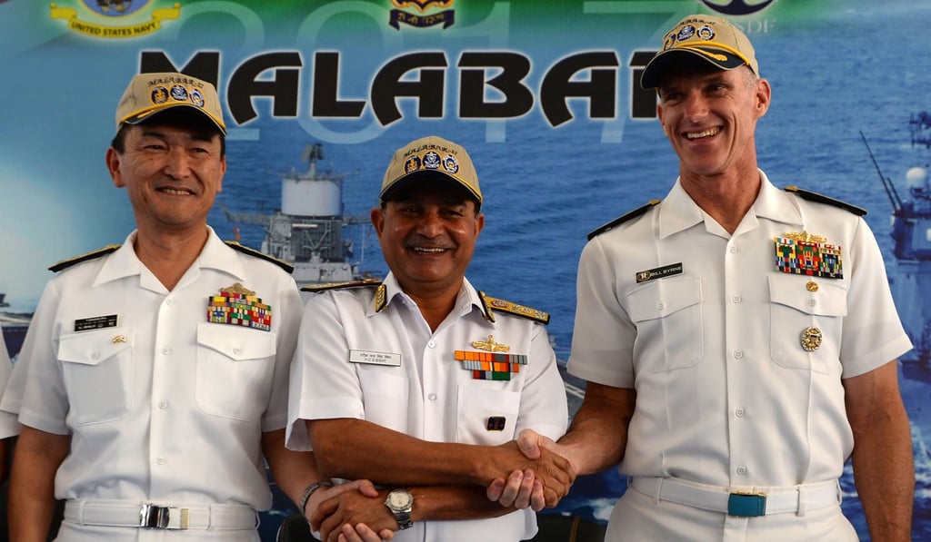 Japanese Rear Admiral Hiroshi Yamamura (left), US Rear Admiral William Byrne (right) and HCS Bisht, vice admiral of the Indian Navy, during the inauguration of joint naval exercises. Photo: AFP Japanese Rear Admiral Hiroshi Yamamura (left), US Rear Admiral William Byrne (right) and HCS Bisht, vice admiral of the Indian Navy, during the inauguration of joint naval exercises. Photo: AFP