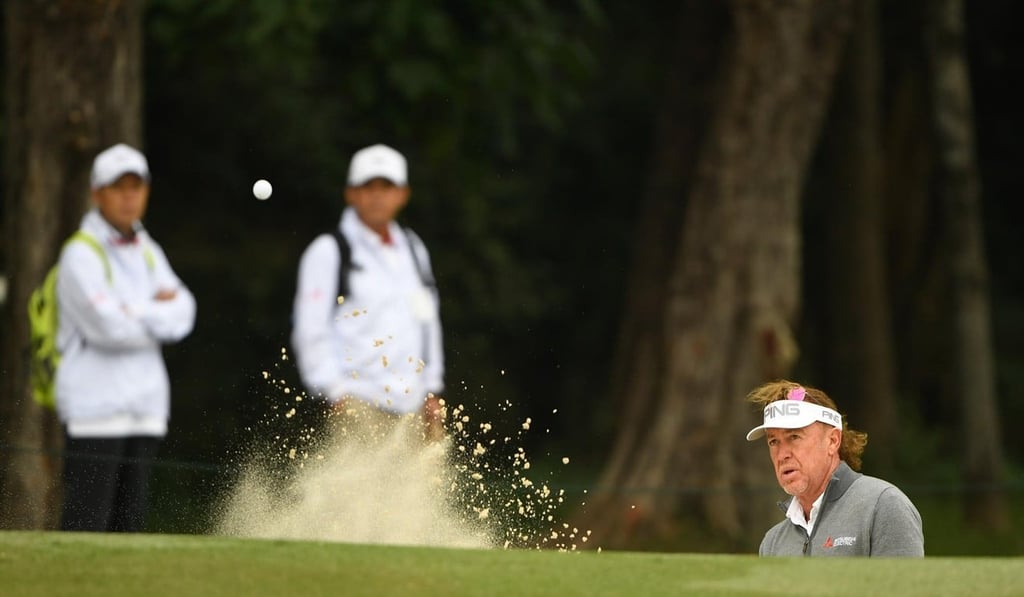 Miguel Angel Jimenez negotiates his way out of a bunker during the Hong Kong Open. Miguel Angel Jimenez negotiates his way out of a bunker during the Hong Kong Open.