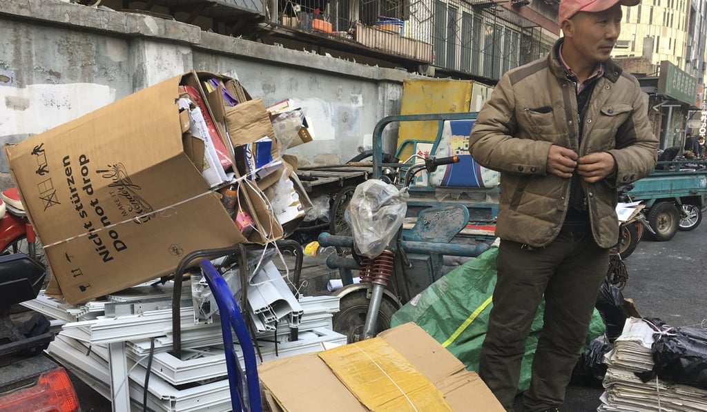 Wang Zhougang wakes up at 5am daily to collect cardboard. Photo: Phila Siu