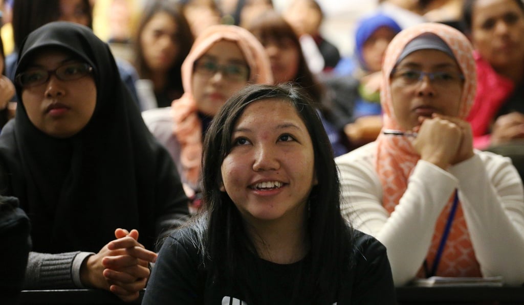 Erwiana Sulistyaningsih attends the launch screening of the film, Erwiana: Justice for All, at City University in March last year. Reports of the horrific physical abuse suffered by the Indonesian domestic helper sparked public outrage and saw her Hong Kong employer sentenced to six years in prison in 2015. Photo: Felix Wong