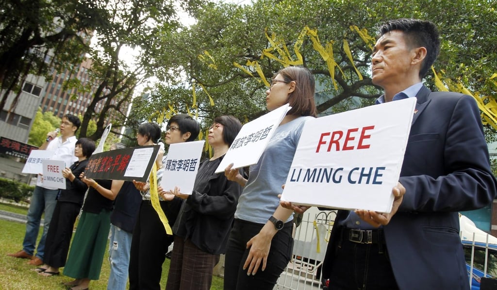 Supporters of activist Lee Ming-cheh hold a protest in Taipei earlier this month calling for his release. Photo: AP Supporters of activist Lee Ming-cheh hold a protest in Taipei earlier this month calling for his release. Photo: AP