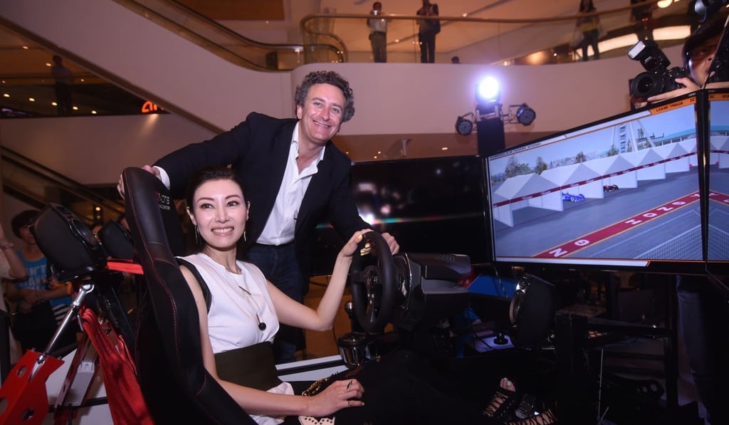 Agag with former Miss Hong Kong Michele Reis. Photo: Handout
