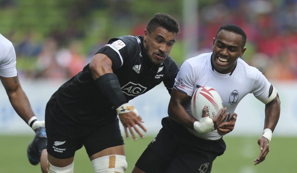 Fiji's Waisea Nacuqu is tackled by New Zealand's Iopu Iopu-Aso at the Hong Kong Sevens. Photo: Xiaomei Chen