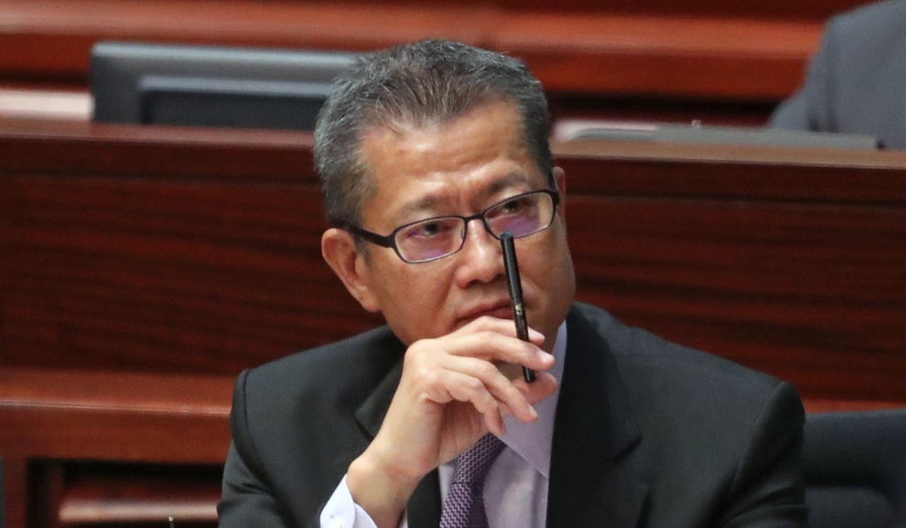 Financial Secretary Paul Chan attends a Legco meeting in Tamar on November 9. In his budget speech in January, Chan announced that the waiver on the first registration tax for electric vehicles would be capped at HK$97,500. As a result, EV registration fell sharply once the cap came into effect in April. Photo: K.Y. Cheng