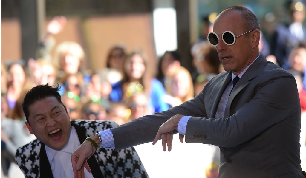 File photo of Lauer with South Korean singer PSY on the Today show in 2013. Photo: AFP