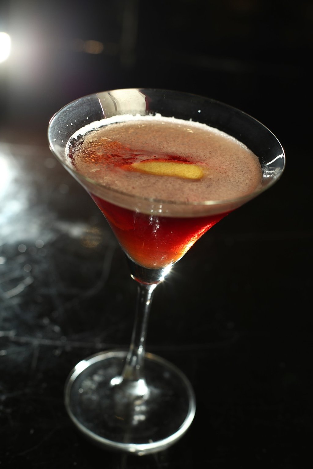 Knob Creek Manhattan (Knob Creek bourbon, rosso vermouth, Angostura bitters, orange peel) at Lawry’s. Photo: Nora Tam