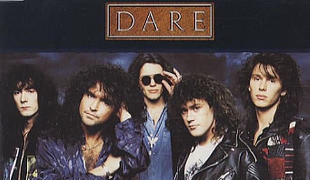 Cox (far right) with the 1980s band Dare.