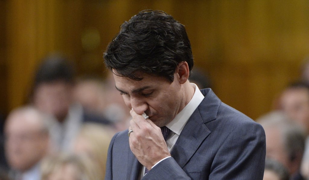 Prime Minister Justin Trudeau pauses while making a formal apology to individuals harmed by federal legislation, policies, and practices that led to the oppression of and discrimination against LGBTQ people in Canada, in the House of Commons in Ottawa on Tuesday. Photo: AP