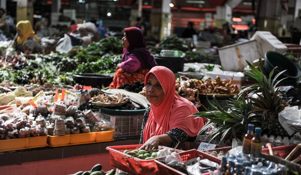 A vendor waits for customers at the Siti Khadijah market in Kota Bharu, Kelantan state, Malaysia. Photo: AFP