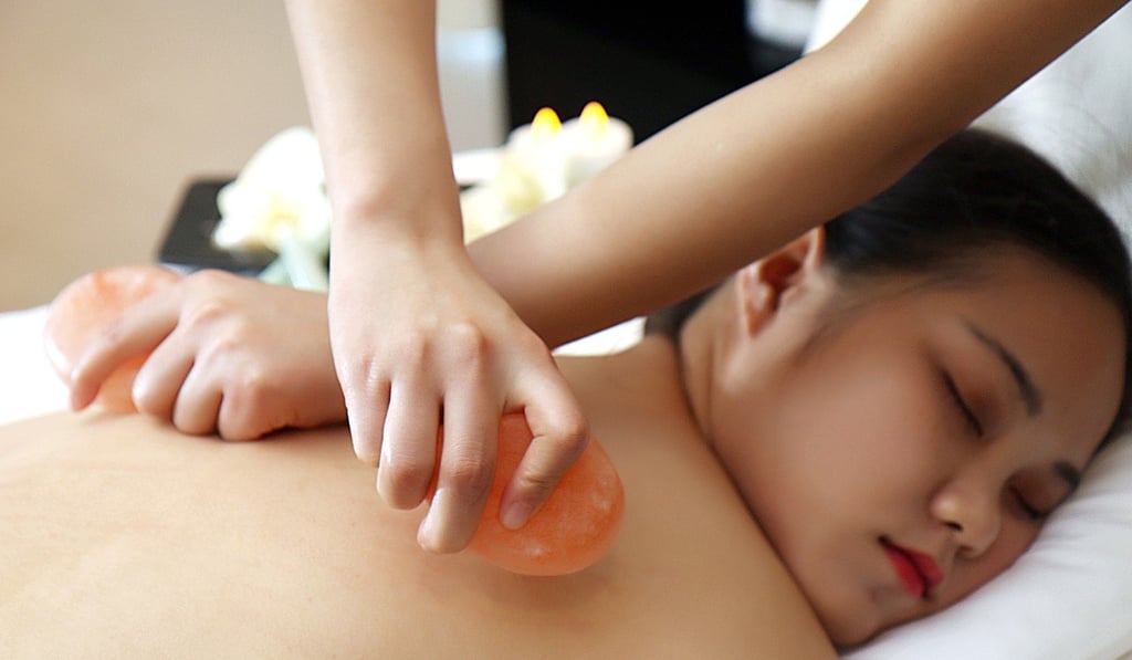 A Himalayan pink salt stone massage at the Crystal Life Asian Spa on board Genting Dream.