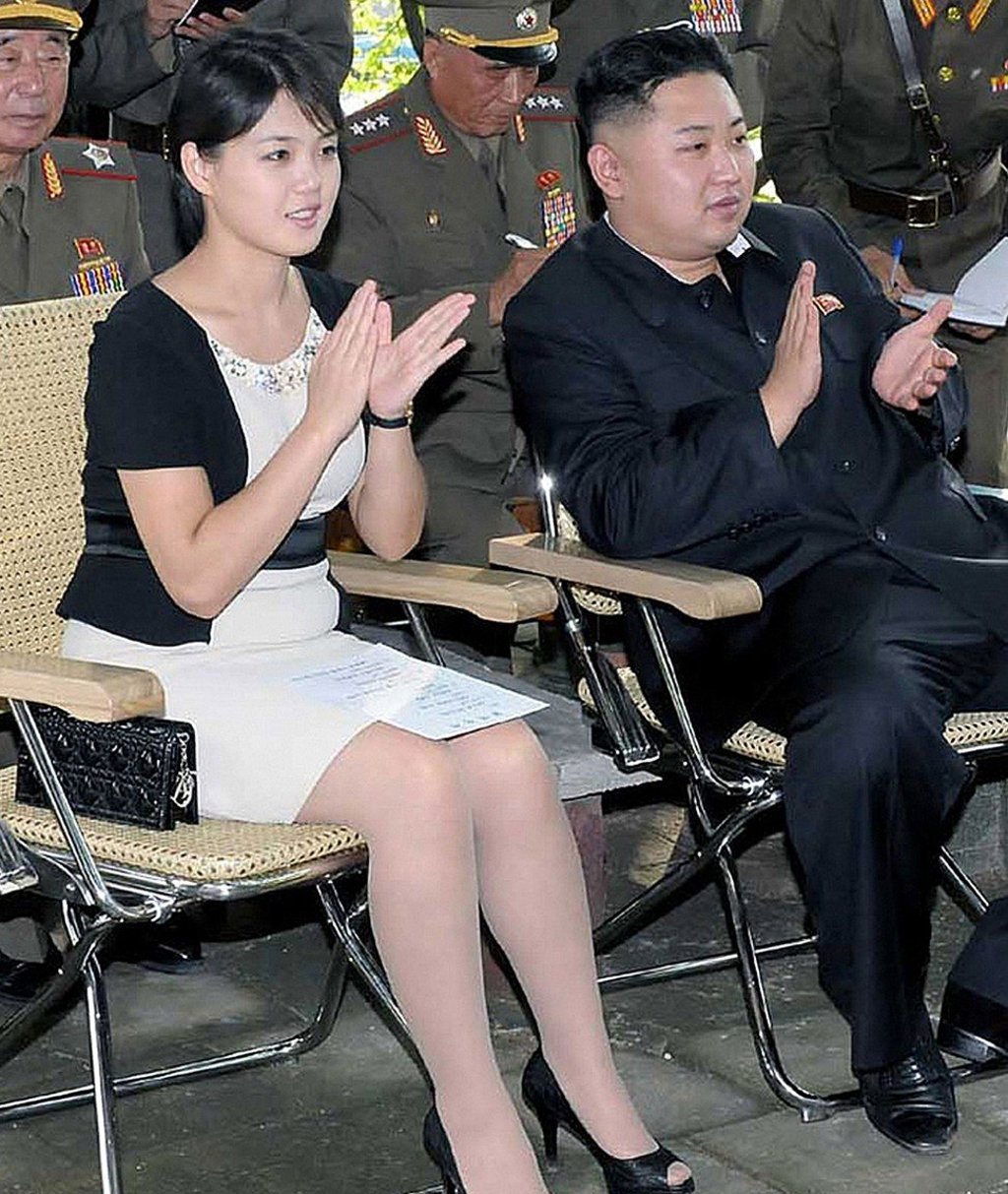 North Korea’s young first lady is pictured with a stylish Christian Dior handbag. Photo: AFP