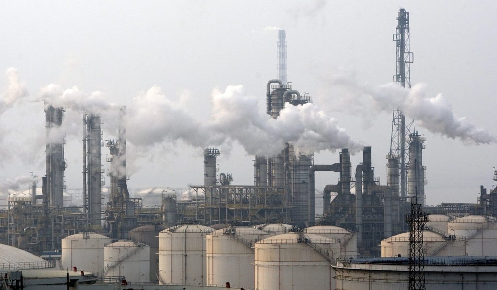 Smoke billows from an oil refinery in Qingdao in Shandong province. Photo: EPA