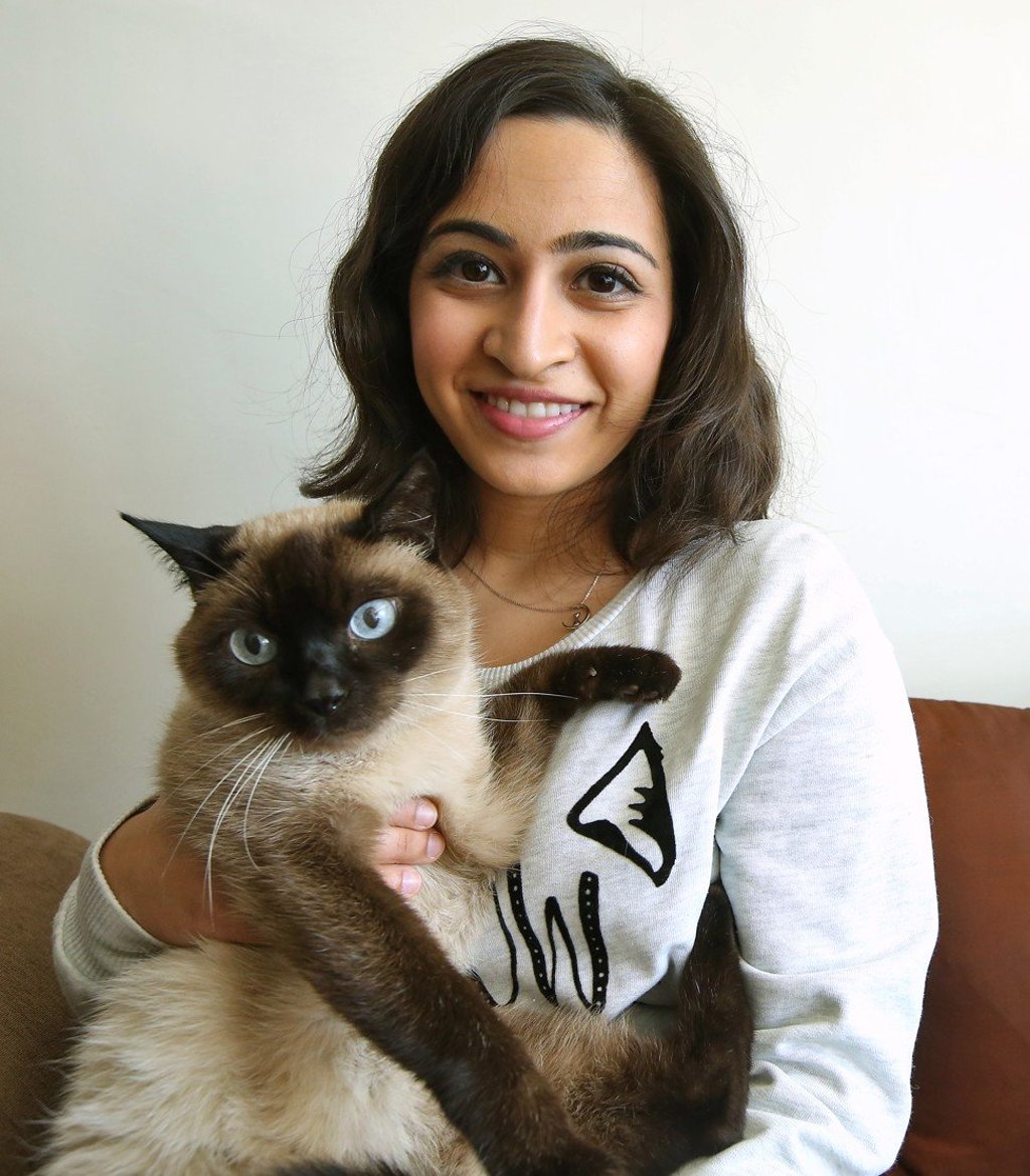 Pooja Ramchandani and her cat Gideon in Tung Chung. Photo: Edmond So