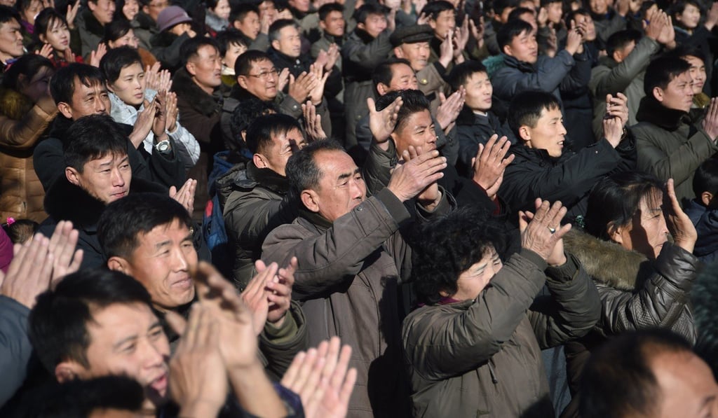 Pyongyang residents react to an announcement by North Korean leader Kim Jong-un that the country has achieved full nuclear statehood after testing a missile capable of hitting anywhere in the United States. Photo: AFP