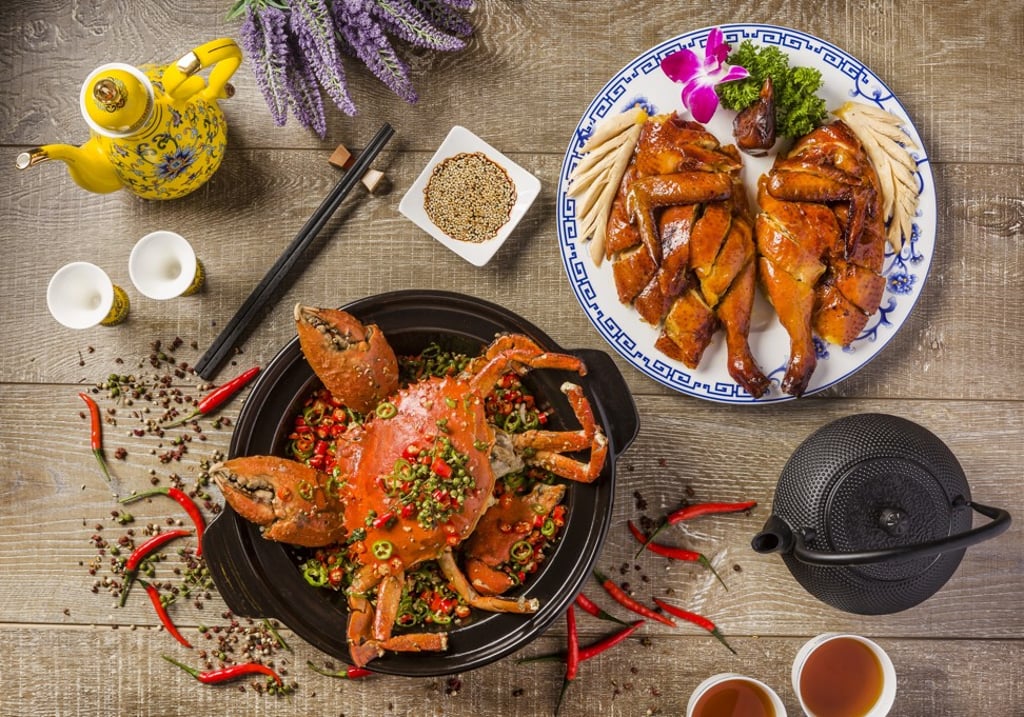 San Xi Lou’s baked crab and roast chicken. San Xi Lou’s baked crab and roast chicken.