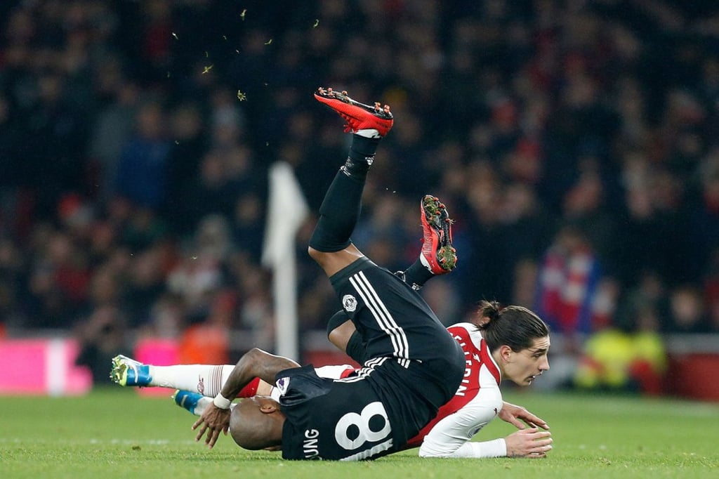 Arsenal’s Hector Bellerin fouls Manchester United’s Ashley Young. Photo: AFP Arsenal’s Hector Bellerin fouls Manchester United’s Ashley Young. Photo: AFP