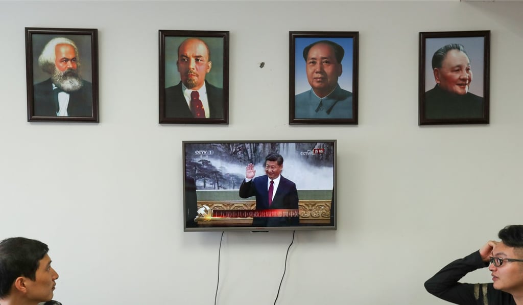 Portraits of Karl Marx, Vladimir Lenin and China’s late leaders Mao Zedong and Deng Xiaoping in Beijing. Photo: Reuters