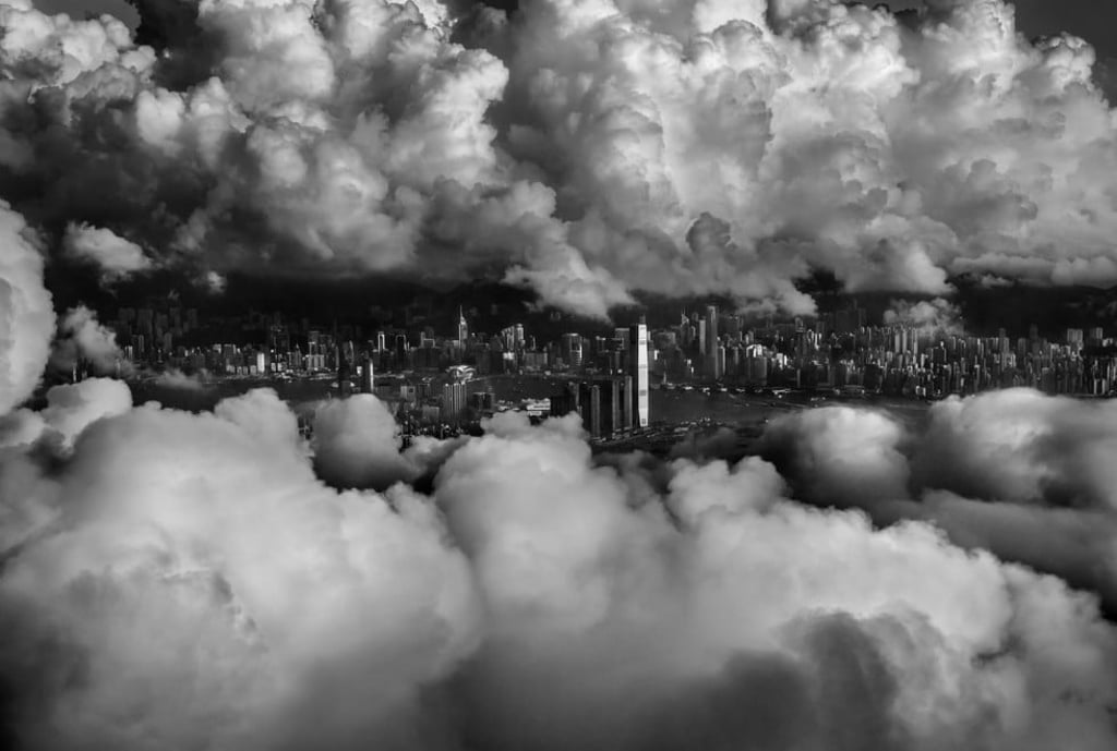 “I took this from the window of a plane landing in Hong Kong,” photographer Palani Mohan says. “I have a camera with me at all times when I fly and this was an amazing moment. It lasted for less than a second and I had just awoken; it was dream-like to see the city in such a way, which fits well with the whole concept of the book. It’s a view of Hong Kong that will never be repeated.”
