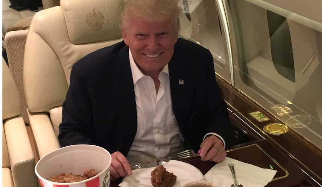 Donald Trump shared a photo of himself tucking into a KFC dinner with silverware (pictured) after a day of campaigning in major swing states Ohio and Pennsylvania last year. Photo: Twitter