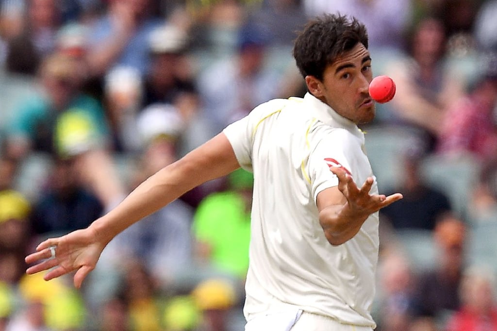 Australia paceman Mitchell Starc takes a sharp catch off his own bowling. Photo: AFP Australia paceman Mitchell Starc takes a sharp catch off his own bowling. Photo: AFP