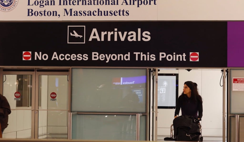 A passenger arrives at Logan International Airport in Boston. The US Supreme Court has allowed President Donald Trump’s travel ban to go ahead in full effect as legal challenges continue in lower courts. Photo: EPA A passenger arrives at Logan International Airport in Boston. The US Supreme Court has allowed President Donald Trump’s travel ban to go ahead in full effect as legal challenges continue in lower courts. Photo: EPA