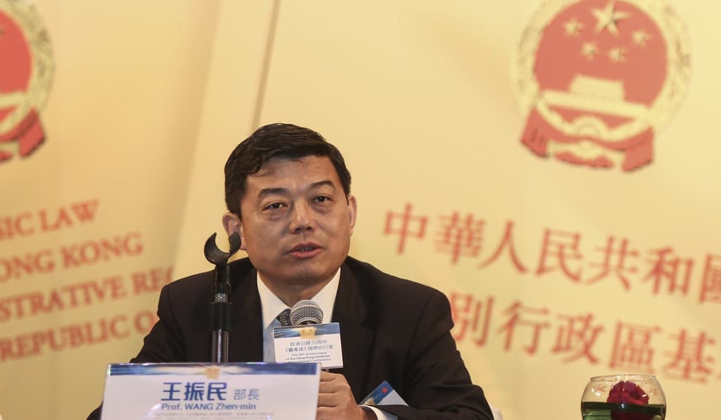 Wang Zhenmin (pictured here at the HKSAR 20th anniversary International Conference on Basic Law: Review and Future on November 17) argues that Hongkongers cannot cherry-pick their national identity. Photo: Xiaomei Chen