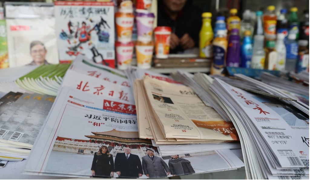 Chinese newspapers are displayed at a news stand in Beijing on November 9, during the time of US President Donald Trump’s visit. Chinese people believe that the media reports only that which the government approves. Photo: EPA-EFE Chinese newspapers are displayed at a news stand in Beijing on November 9, during the time of US President Donald Trump’s visit. Chinese people believe that the media reports only that which the government approves. Photo: EPA-EFE