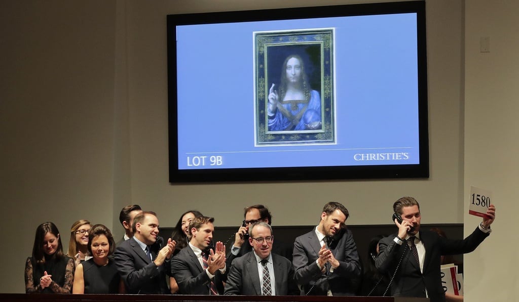 Bidding representatives react after Leonardo da Vinci's Salvator Mundi sells for US$450 million at Christie’s in New York on November 15. Photo: AP