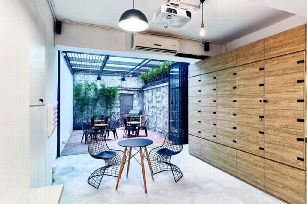 A ground-floor hot-desk area at TheDesk. A ground-floor hot-desk area at TheDesk.