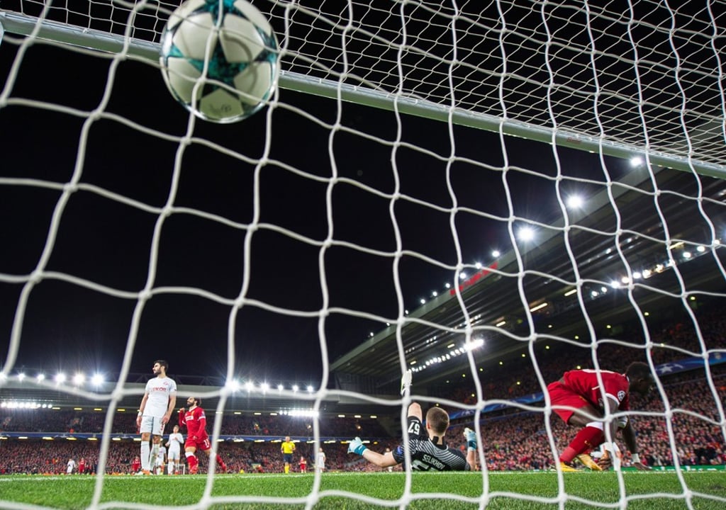 Liverpool’s Sadio Mane (R) scores to make the score 6-0 to the Reds. Photo: EPA