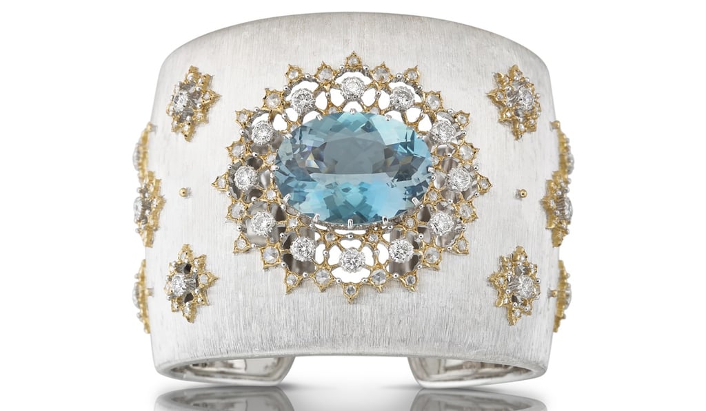 The Oasi cuff bracelet features a silky white gold surface and yellow gold openwork, with a 16.72ct acquamarine, 24 round brilliant-cut diamonds and 135 pink cut diamonds. Price on request The Oasi cuff bracelet features a silky white gold surface and yellow gold openwork, with a 16.72ct acquamarine, 24 round brilliant-cut diamonds and 135 pink cut diamonds. Price on request