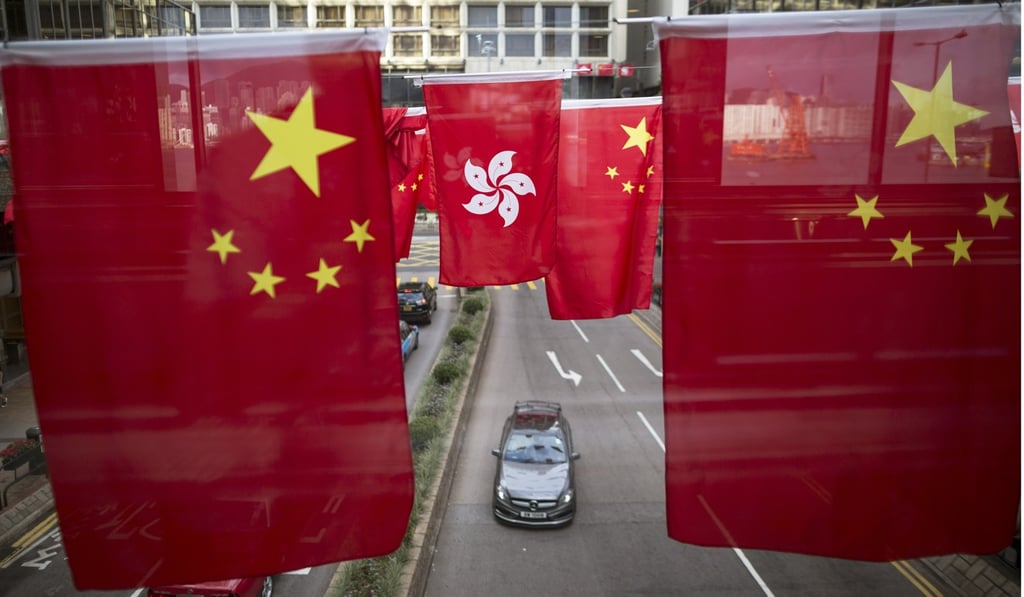 Chinese and Hong Kong flags are displayed in June this year, ahead of the 20th anniversary of the handover in Hong Kong. Photo: EPA