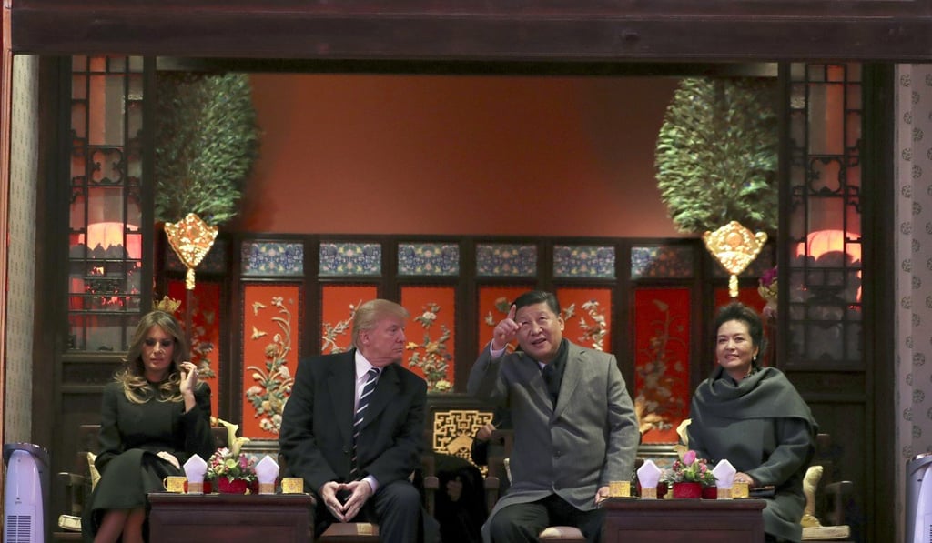 Donald Trump, pictured with Xi Jinping and the respective first ladies, during his visit to China last month