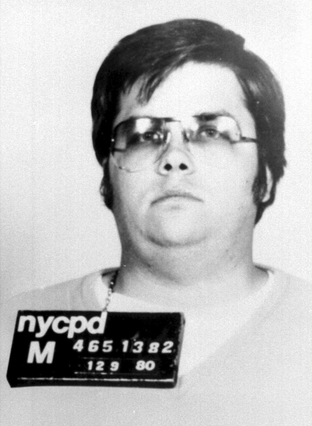 A police handout dated December 9, 1980 shows Lennon's assassin, Mark David Chapman. Picture: AFP A police handout dated December 9, 1980 shows Lennon's assassin, Mark David Chapman. Picture: AFP
