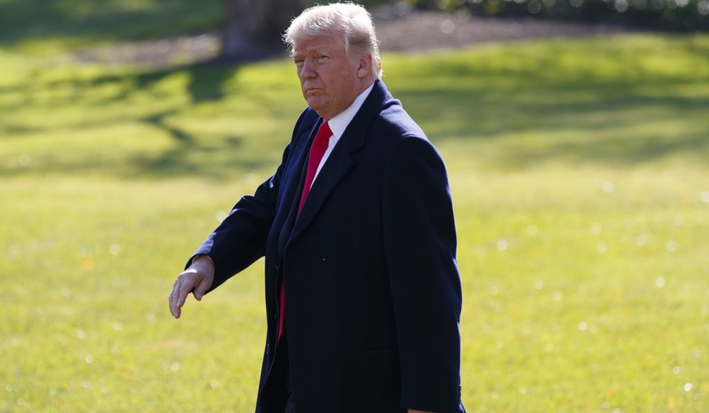 President Donald Trump walks to board Marine One on the South Lawn of the White House. Photo: AP