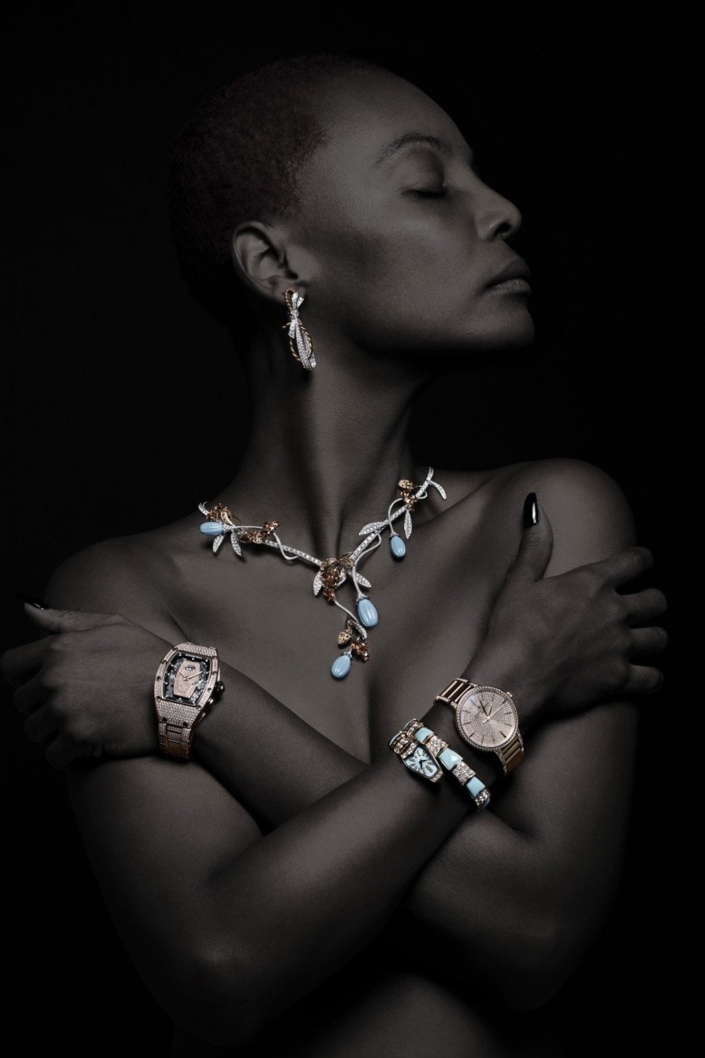 CHAUMET Insolence earring in white and pink gold with diamonds, HK$346,000; VAN CLEEF & ARPELS Fleurs d'Orient necklace in white and pink gold with diamonds, turquoise, spessartite garnets, price on request. On arms, from left: RICHARD MILLE RM037 Ladies Automatic watch in red gold and diamonds, HK$3,704,000; BULGARI Serpenti bracelet watch in pink gold with diamonds, turquoise, mother-of-pearl, HK$447,000; VACHERON CONSTANTIN Patrimony small model watch in pink gold with diamonds, price on request