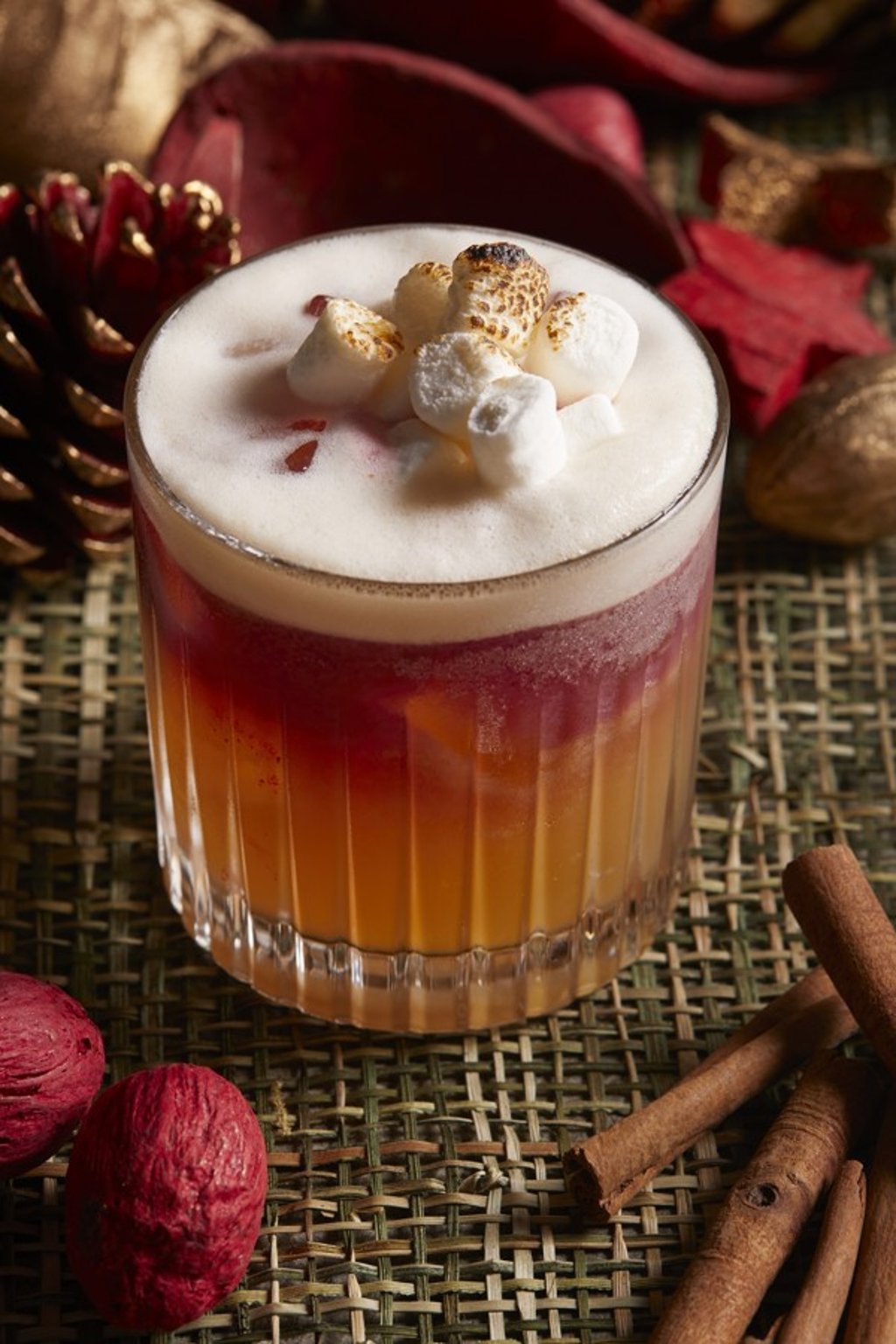The Optimist restaurant in Wan Chai serves the Canela, a blend of Wild Turkey bourbon, cinnamon syrup, red wine and lime juice, topped with egg white and flambéed marshmallows.