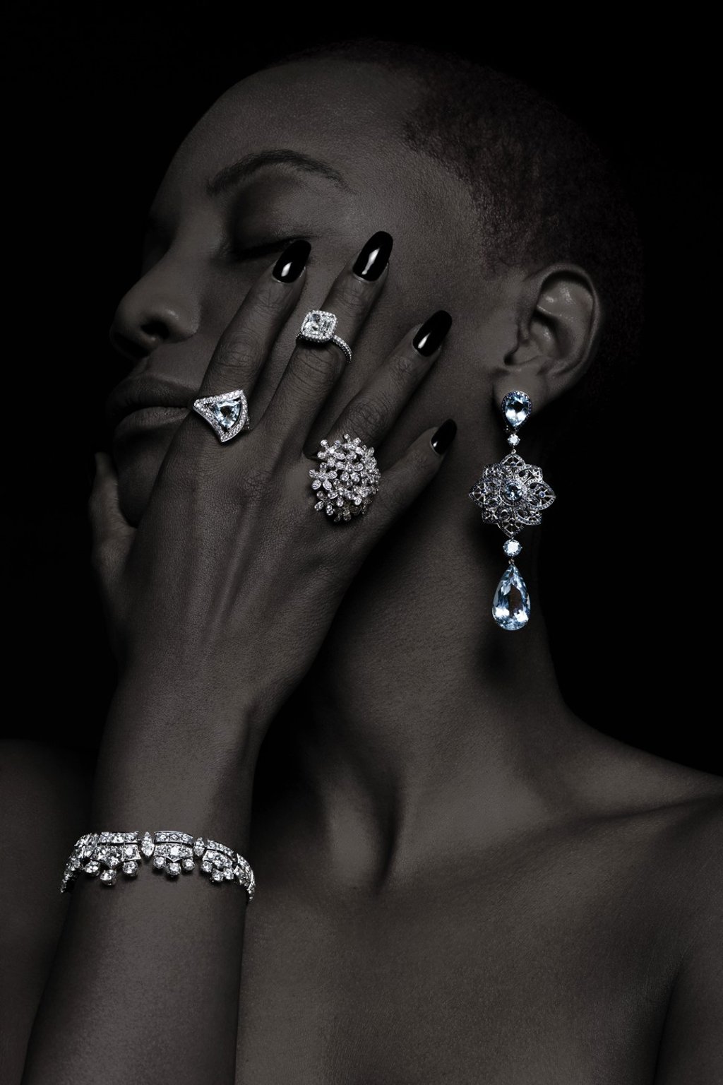 DE BEERS Phenomena Frost bracelet in white gold and diamonds, HK$855,000. Rings, from left: BULGARI Divas' Dream ring in white gold with aquamarine and diamonds, HK$76,100; DE BEERS Aura ring set in platinum with 4.01ct cushion-cut diamond HK$990,000; VAN CLEEF & ARPELS Socrate ring in white gold and diamonds, HK$277,000; CHOPARD Temptations earrings in white gold with aquamarines and sapphires, price on request