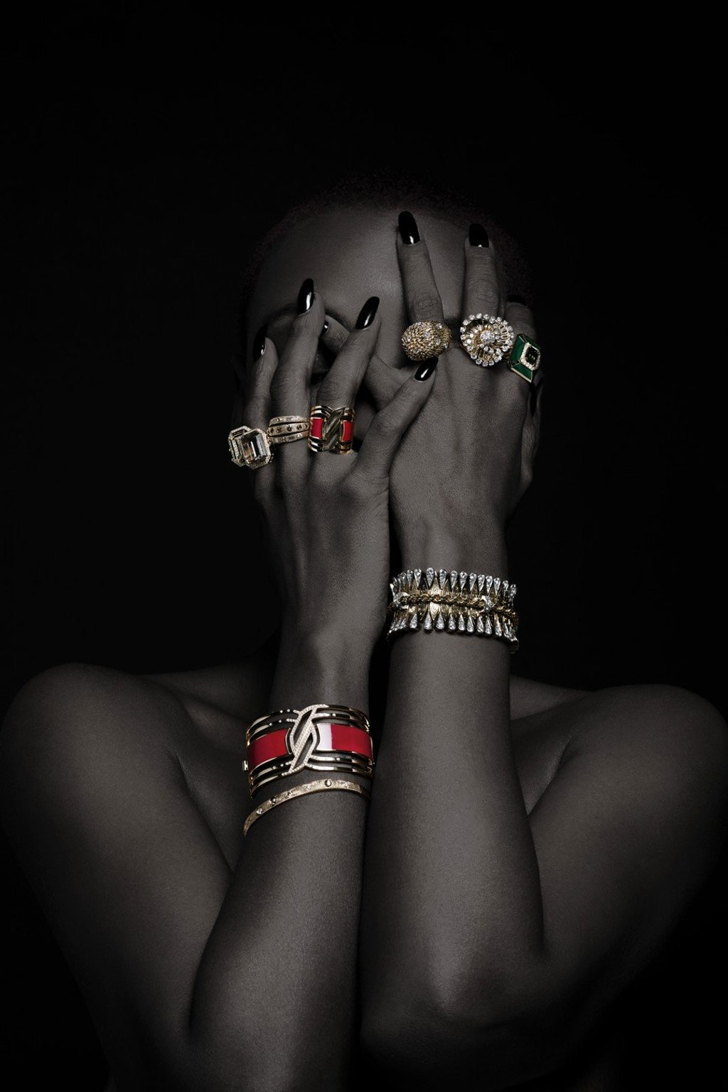 Rings, from left: CHANEL My Chain ring in yellow gold, smoky quartz rutile and diamonds; HK$107,300; DE BEERS Talisman 3-Line ring in yellow gold with diamonds, HK$99,500; CHANEL My Red Ring in yellow gold and red hyceram, HK$61,300; VAN CLEEF & ARPELS Heritage Epis ring in yellow gold, platinum with diamonds, HK$85,000, Heritage Tourbillon ring in yellow gold, platinum with diamonds, HK$434,000; CHANEL My Green Ring in yellow gold and green tourmaline, malachites and diamonds, HK$126,900. On arms, from left: CHANEL My Red Cuff in yellow gold, diamonds and red hyceram, HK$263,000; DE BEERS Talisman hinged oval bangle in yellow gold with diamonds, HK$88,500; VAN CLEEF & ARPELS Heritage Jalousie Bateau bracelet in yellow gold, platinum with diamonds and pink gold, price on request