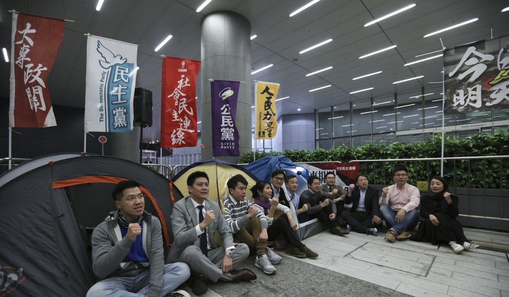 Pan-democratic lawmakers camping outside Legco in protest on Monday. Photo: Felix Wong