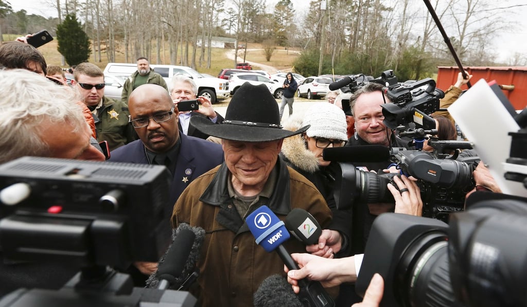 Republican US Senate candidate Roy Moore talks to the media on election day as he votes on Tuesday in Gallant, Alabama. Photo: AP