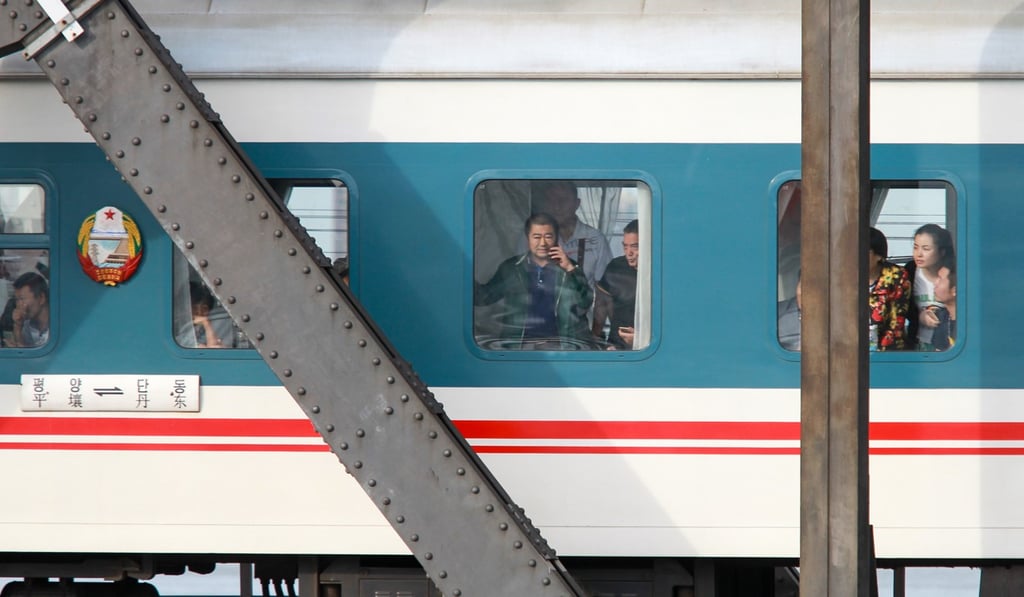 Chinese tourists ride into Dandong city, Liaoning province, from Pyongyang. Photo: Simon Song