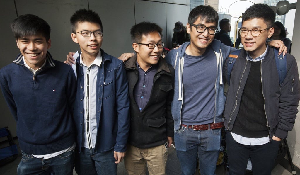 Pro-democracy activists (from left) Lester Shum, Joshua Wong, Raphael Wong, Alex Chow and Nathan Law gather outside Hong Kong’s High Court before their sentencing on contempt of court charges in Hong Kong, on December 7. The activists were being tried for obstructing government bailiffs during the clearance of protesters during the final days of the Occupy protests in 2014. Photo: EPA-EFE Pro-democracy activists (from left) Lester Shum, Joshua Wong, Raphael Wong, Alex Chow and Nathan Law gather outside Hong Kong’s High Court before their sentencing on contempt of court charges in Hong Kong, on December 7. The activists were being tried for obstructing government bailiffs during the clearance of protesters during the final days of the Occupy protests in 2014. Photo: EPA-EFE