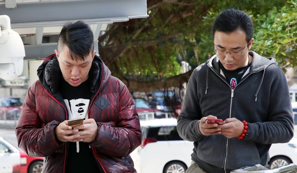 Uber drivers Yip Ka-shing (left) and Lee Kwok-leung appear at Kowloon City Court. Photo: Edward Wong