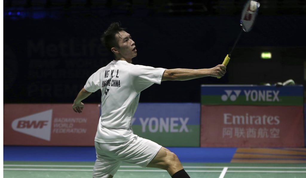 Angus Ng returns a backhand shot against South Korea’s Son Wan-ho. Photo: AP Angus Ng returns a backhand shot against South Korea’s Son Wan-ho. Photo: AP