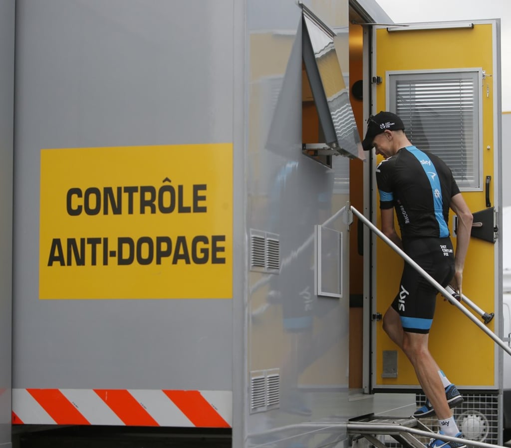 Chris Froome enters the doping control facility after the 17TH stage of the Tour de France. Photo: AP