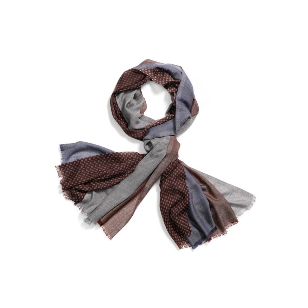 The supersoft cashmere Aylit Daisy scarf has four solid colour panels and features a unique “three-dimensional” design. Price on request